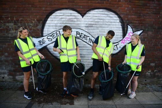 Westside BID goes green collecting a dozen bags of rubbish with local residents