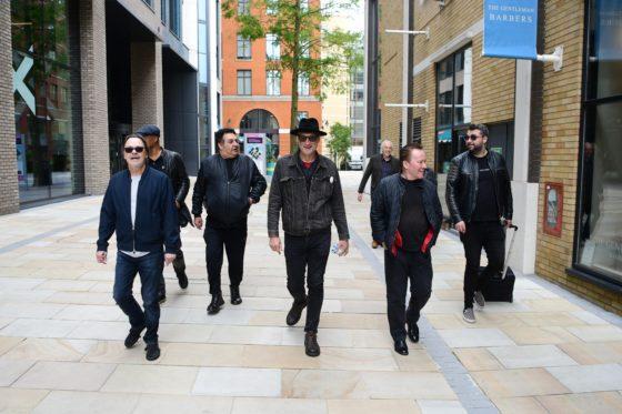 UB40 visit Westside to view band’s street hoarding and try out new TV studio